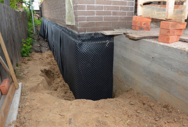 Happy homeowners after waterproofing job in Sheboygan Falls